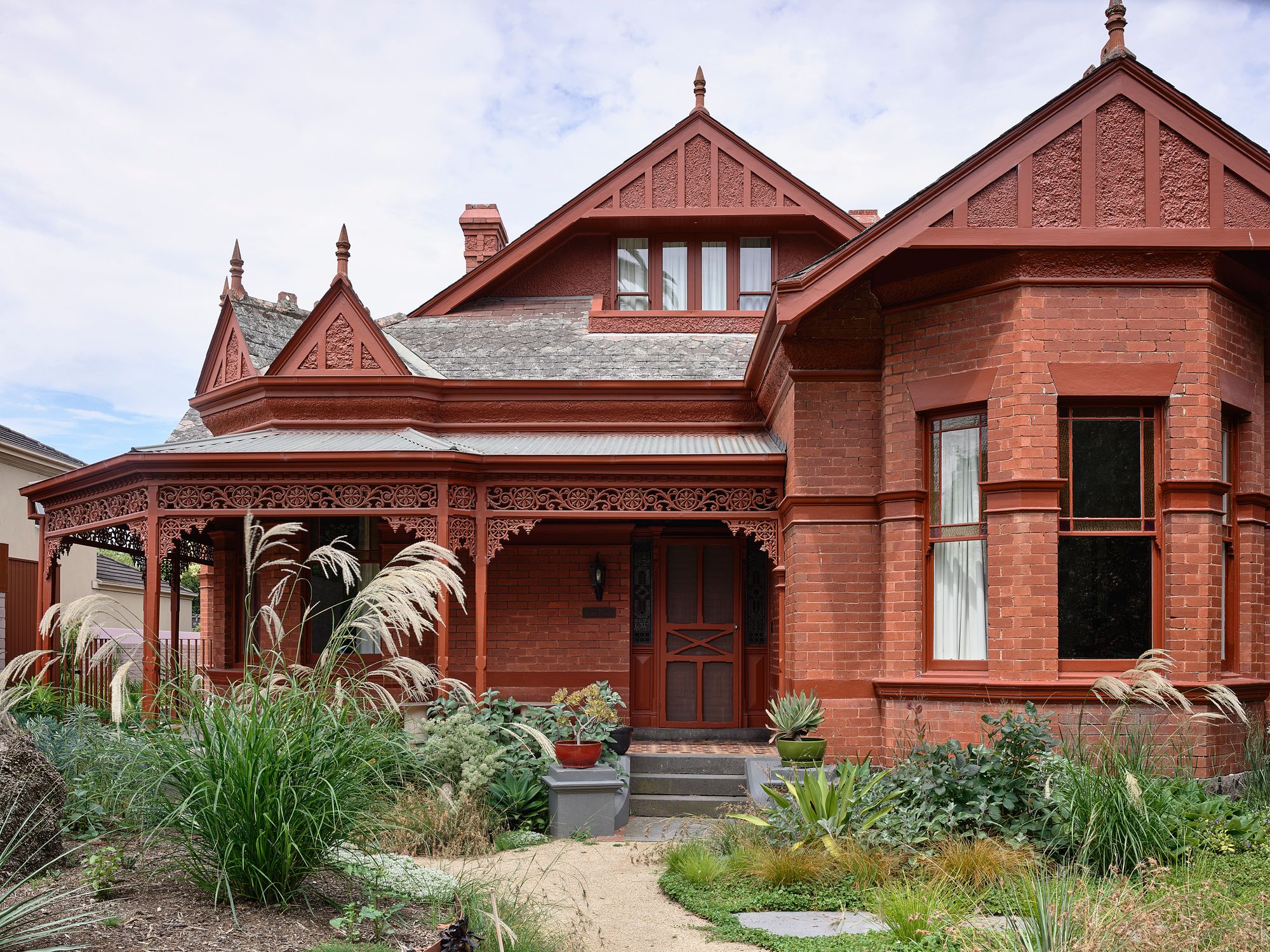 Hermon by WOWOWA. Exterior façade view, path leading to entrance. 