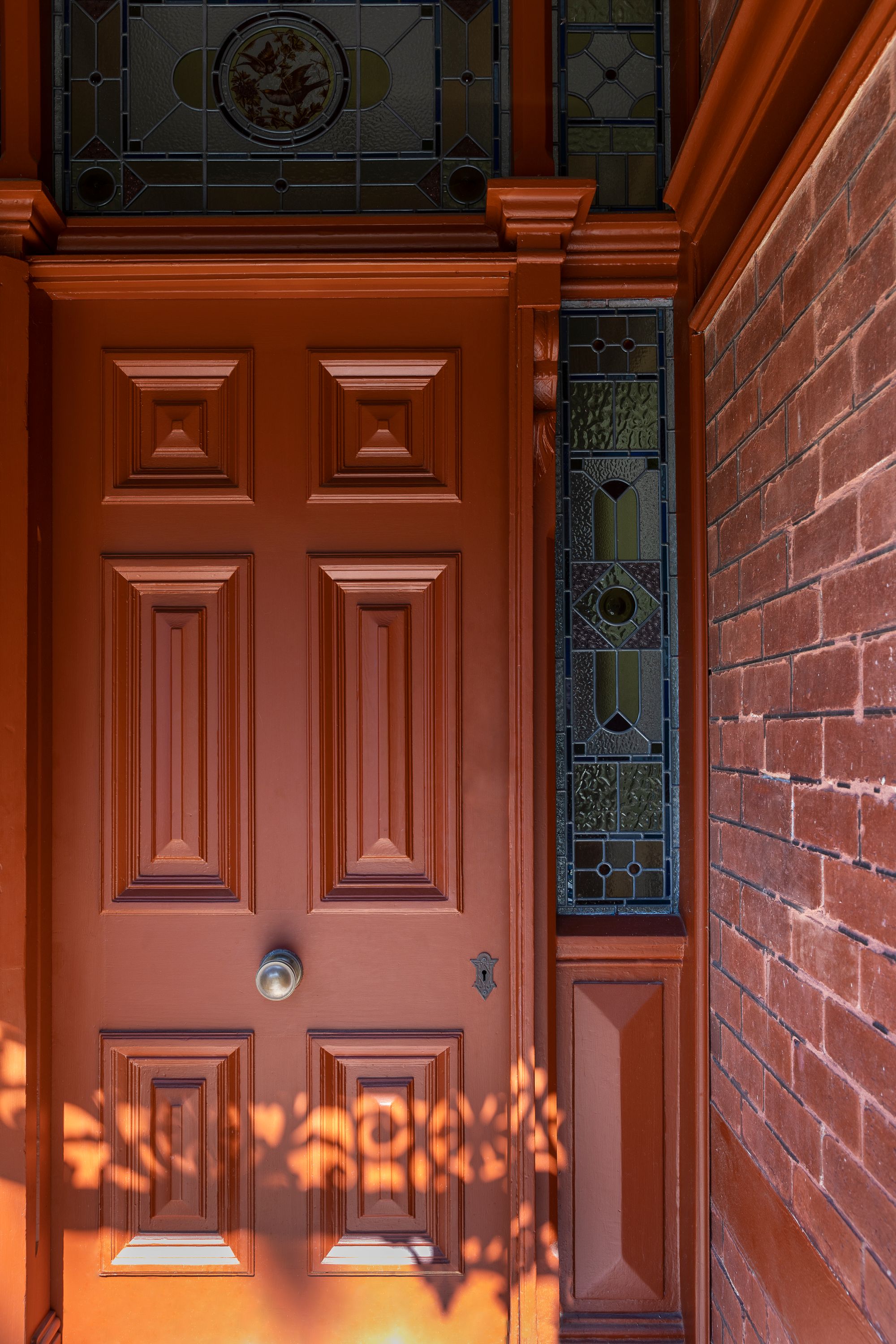 Hermon by WOWOWA. Entry door features federation style stain glass windows. 