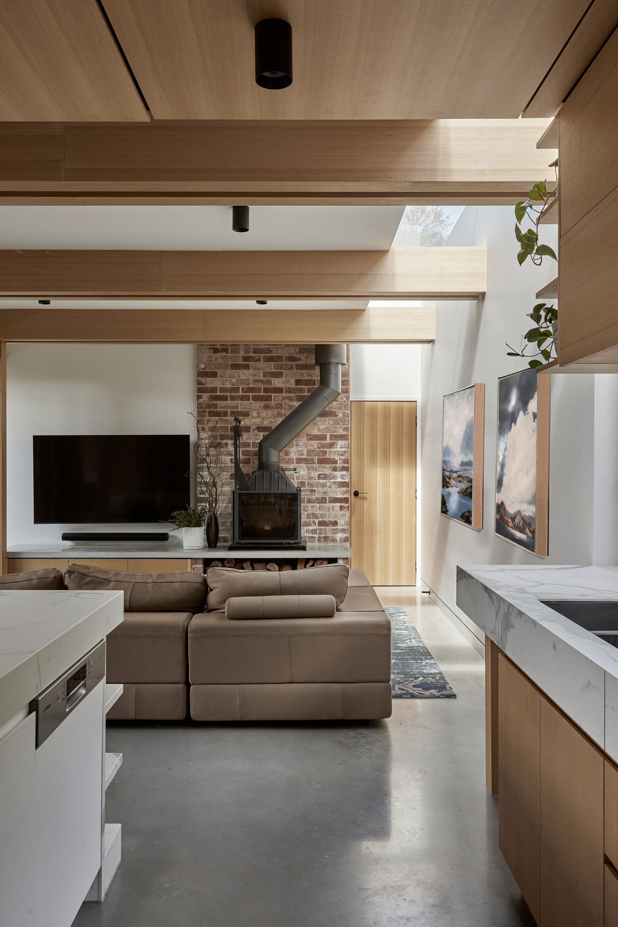 Timber Lantern House by mcmahon and nerlich. View from Kitchen to living room.