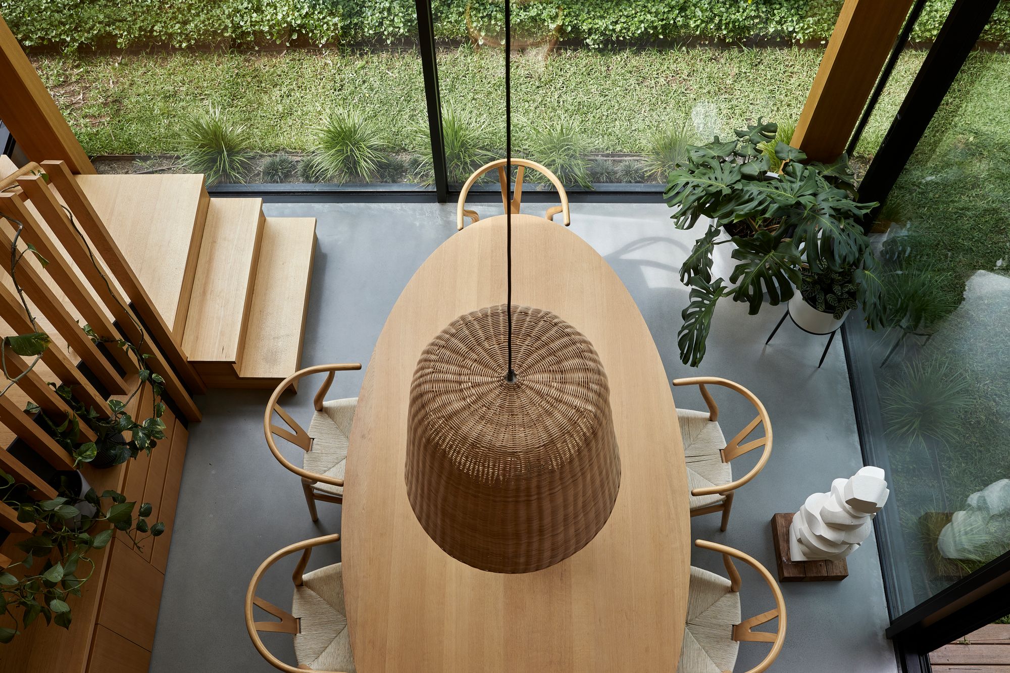 Timber Lantern House by mcmahon and nerlich. Birds eye view down to first floor dining level. 