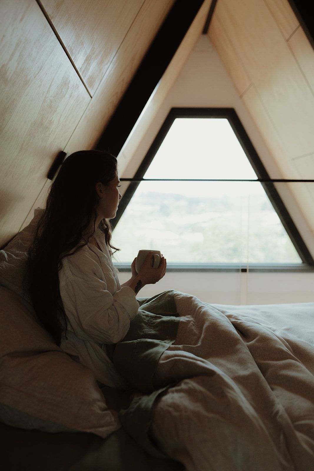 The Eco Cabin Tasmania by Wild Life Environmental. Close up view of loft bedroom.