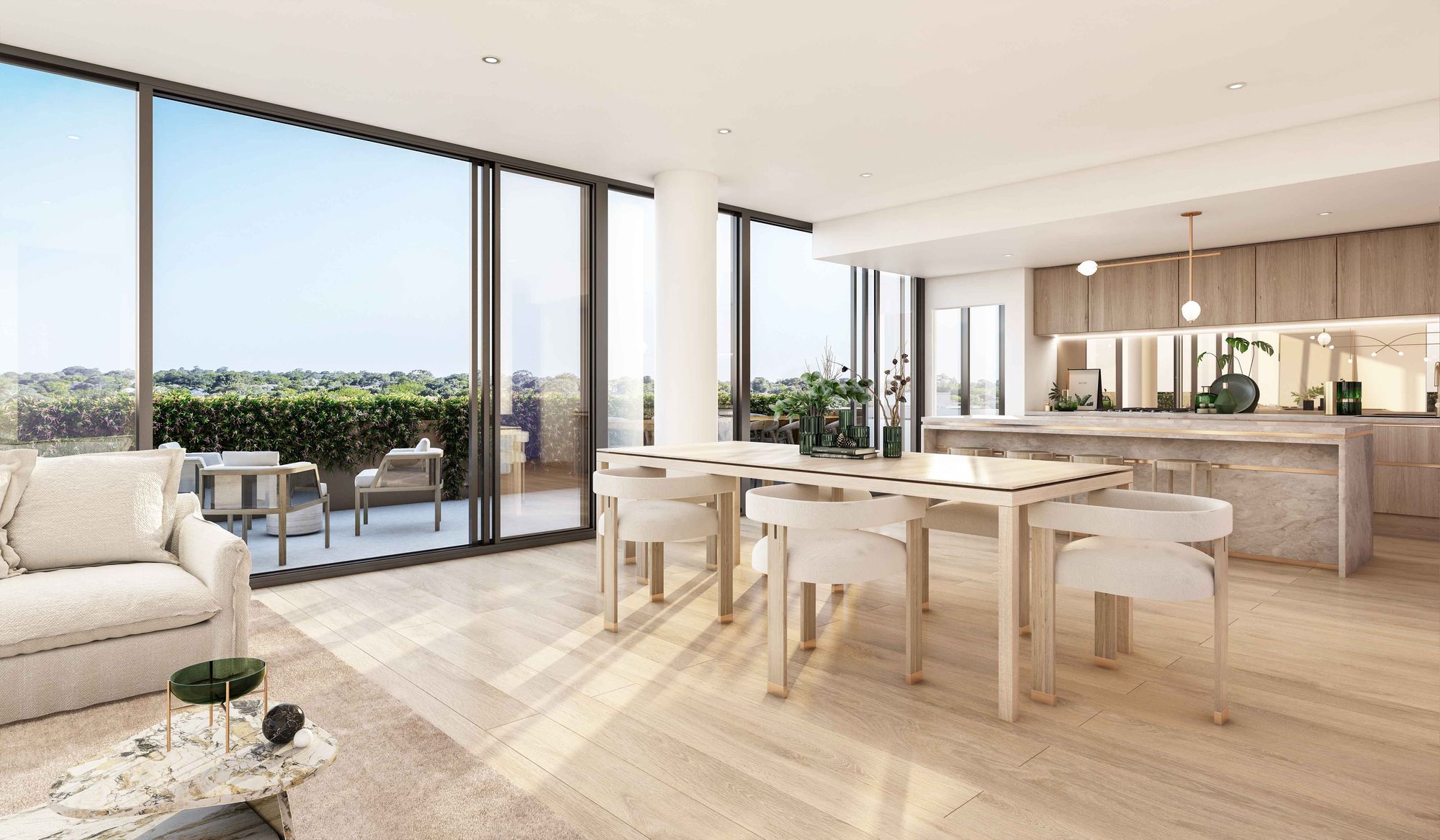 Arbour Park, Surrey Hills by Prime Edition.An open-concept dining and living area boasting large glass doors that open to a balcony, offering an abundance of natural light and a view of the outdoors. The room is furnished with a simple yet sophisticated wooden dining table paired with matching chairs, and a cozy living area with plush seating. The interior palette is composed of light wood tones and cream-colored furnishings, creating a warm and inviting space.