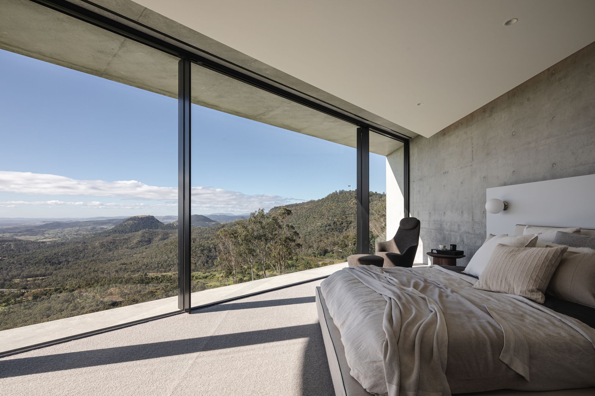 Cliffhanger by Joe Adsett Architects showing an internal bedroom view with view of landscape