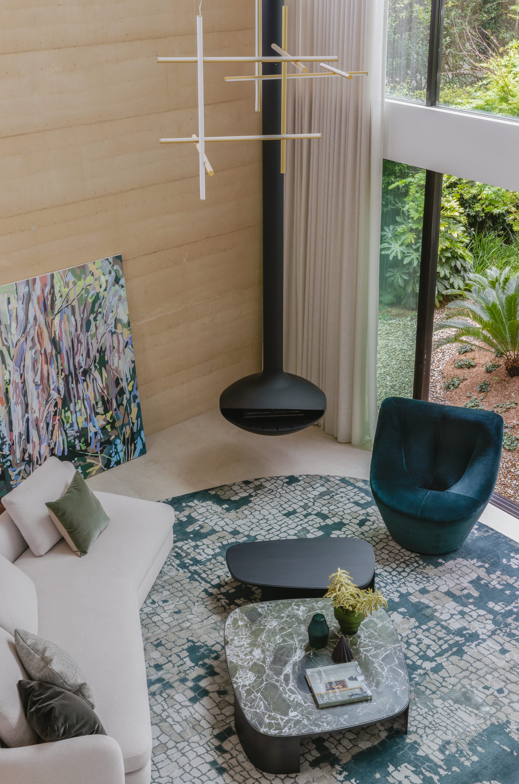 Kenneth Street by Design Studio Group showing a birds eye view of the living room and a glimpse of the garden