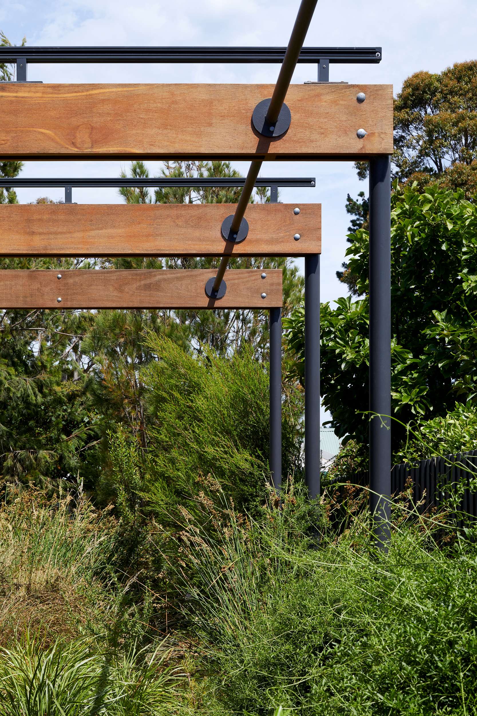 A detail shot of the timber awning in the landscaped garden