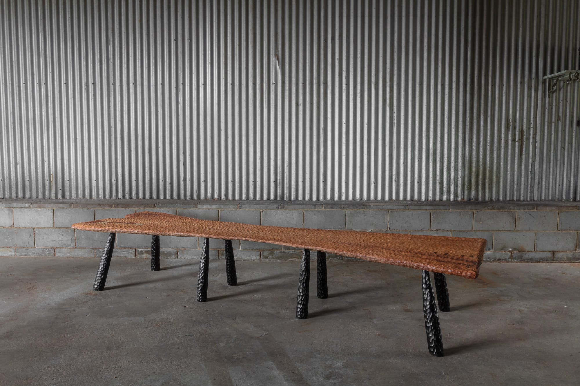 A styled shot of The Benson Long Bench by Two Blue Boys Furniture