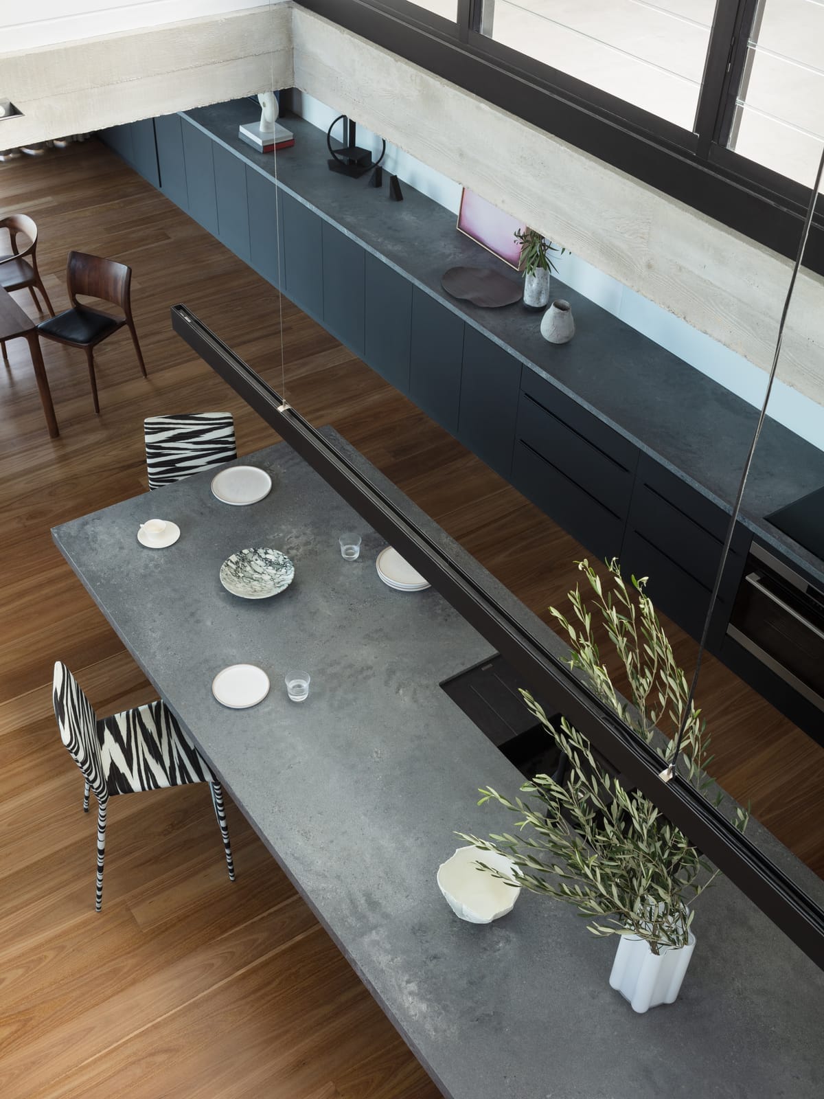 Grandview House by Ian Bennett Design Studio. Photography by Clinton Weaver. Concrete island bench. Timber floors.