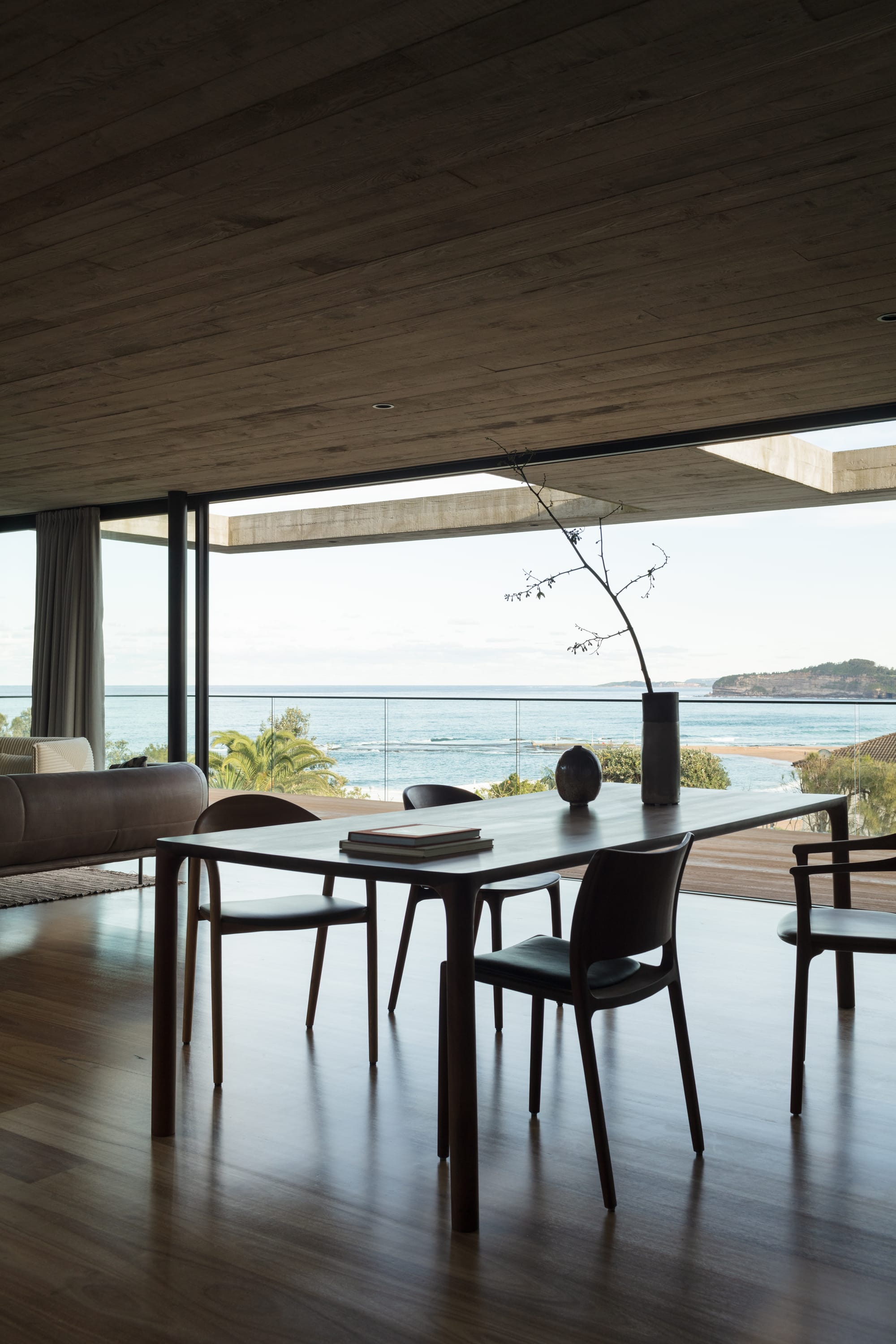 An interior shot of the dining room showing the ocean views out
