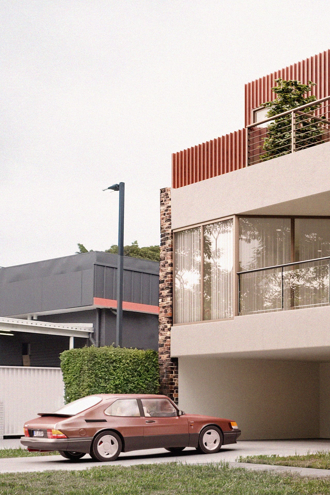 Old South by Studio Shand. Imagery by Lara Clemente. Mid-century modern inspired double storey home with brown car in driveway. Facade constructed of brick, red metal and white render. 
