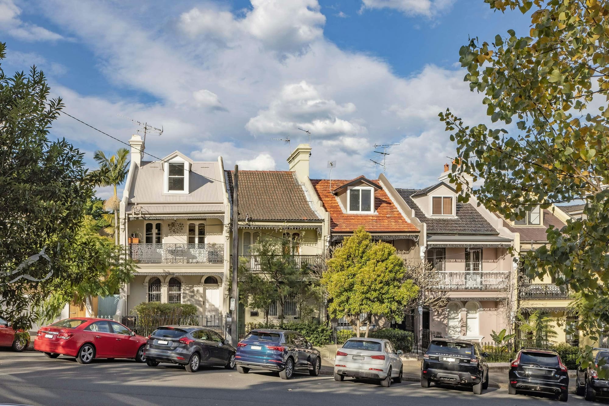 An exterior shot of the street facade of the terrace project