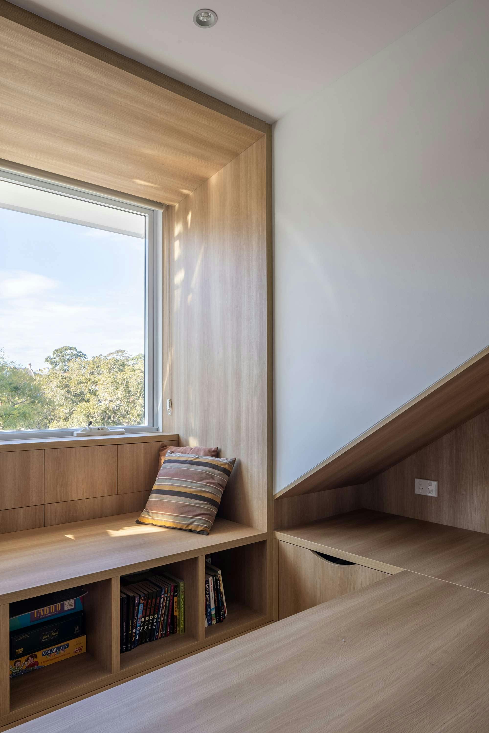 A detail shot of the timber joinery incorporating storage and a window seat