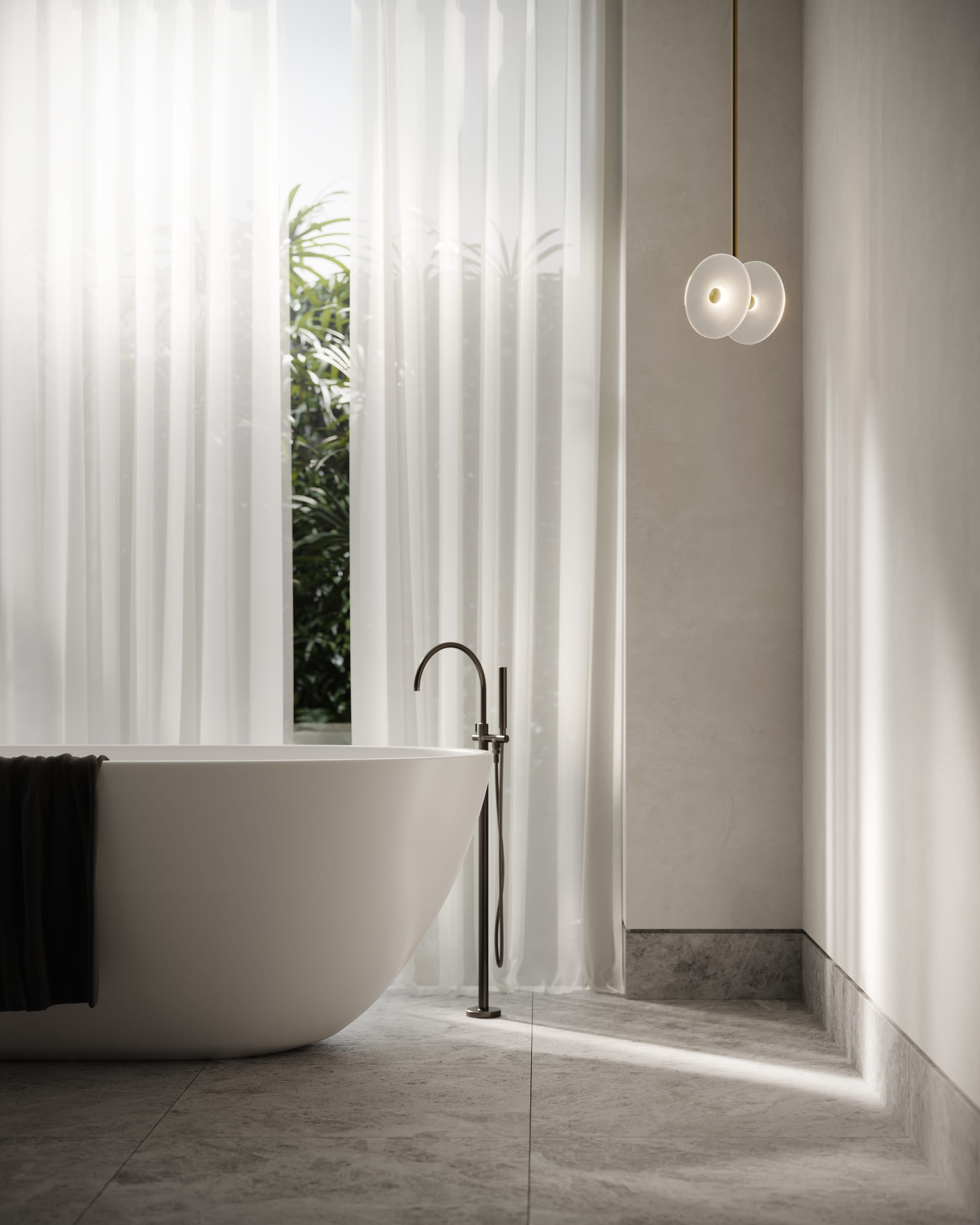 Coral Duo Pendant Light by SOKTAS. Copyright of SOKTAS. Single pole pendant light hanging in corner of bathroom. Freestanding white bathtub on stone floor.  