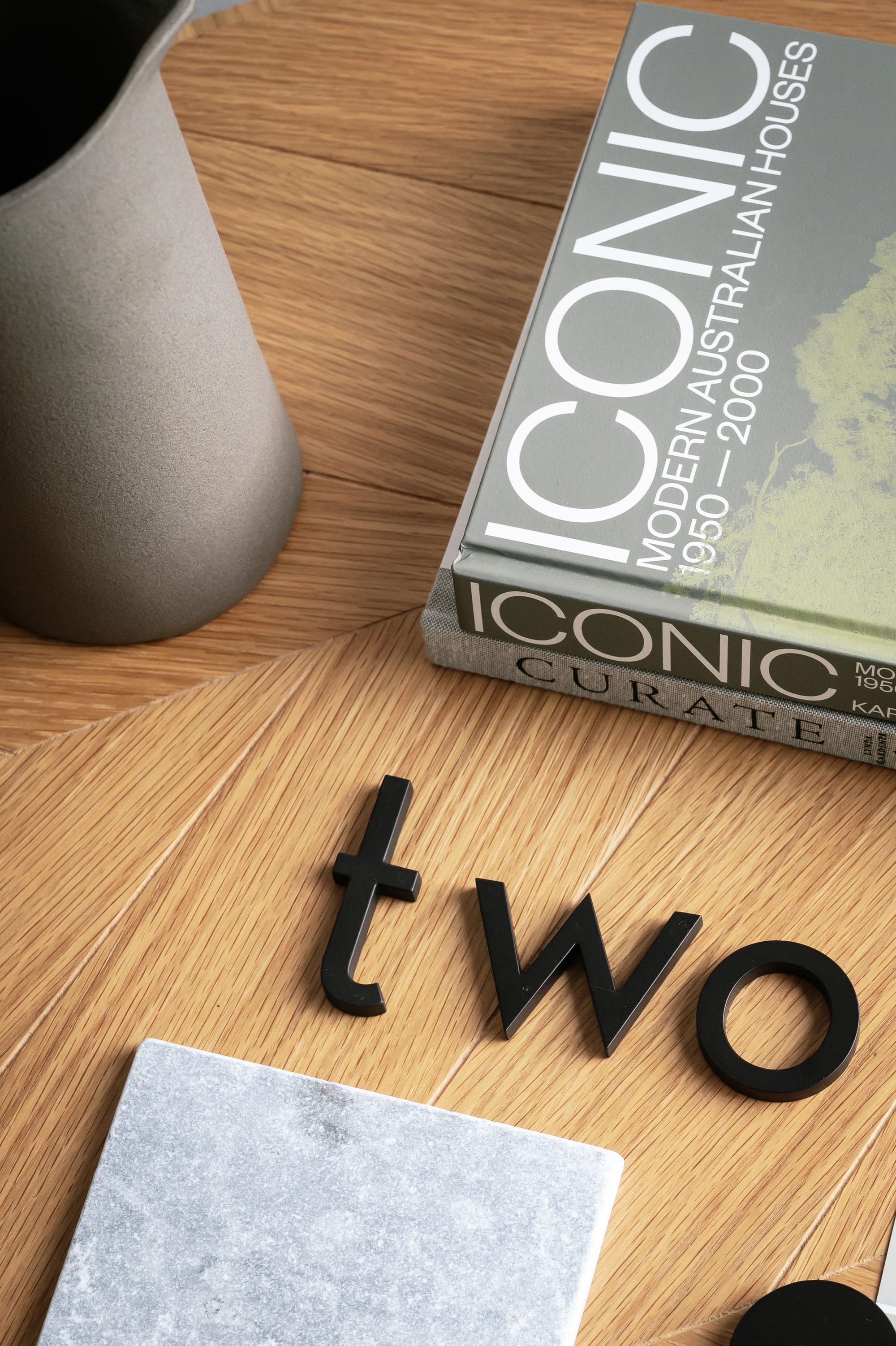 Peninsula House Numbers showing black lettering spelling out 'two'