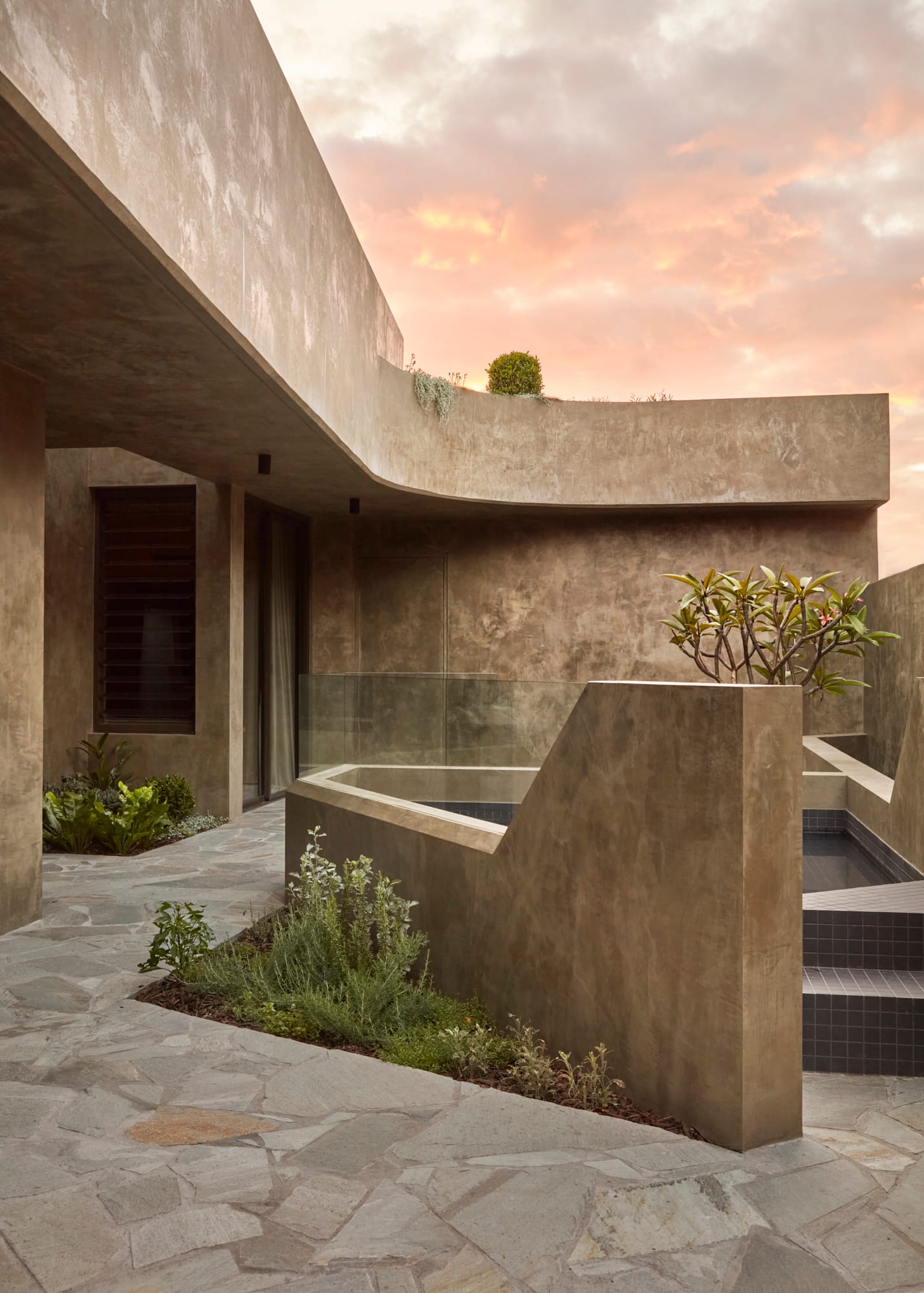 Proclamation House by State of Kin. Modern Contemporary family home inner courtyard with view on hempcrete facade and pool.