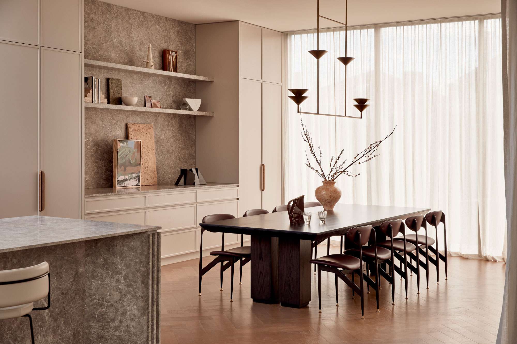 Deco House by Cera Stribley showing the interior with a well styled dining setting with pendant over.