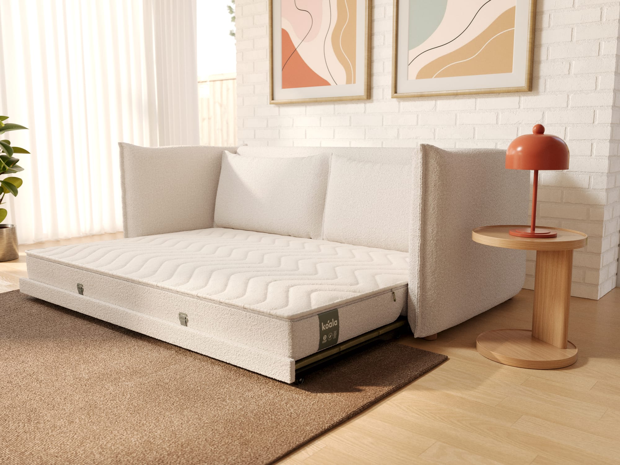 Byron Sofa Bed in Ocean Salt by Koala. White boucle sofa bed next to a timber coffee table, in front of a white brick wall and on a brown rug. 