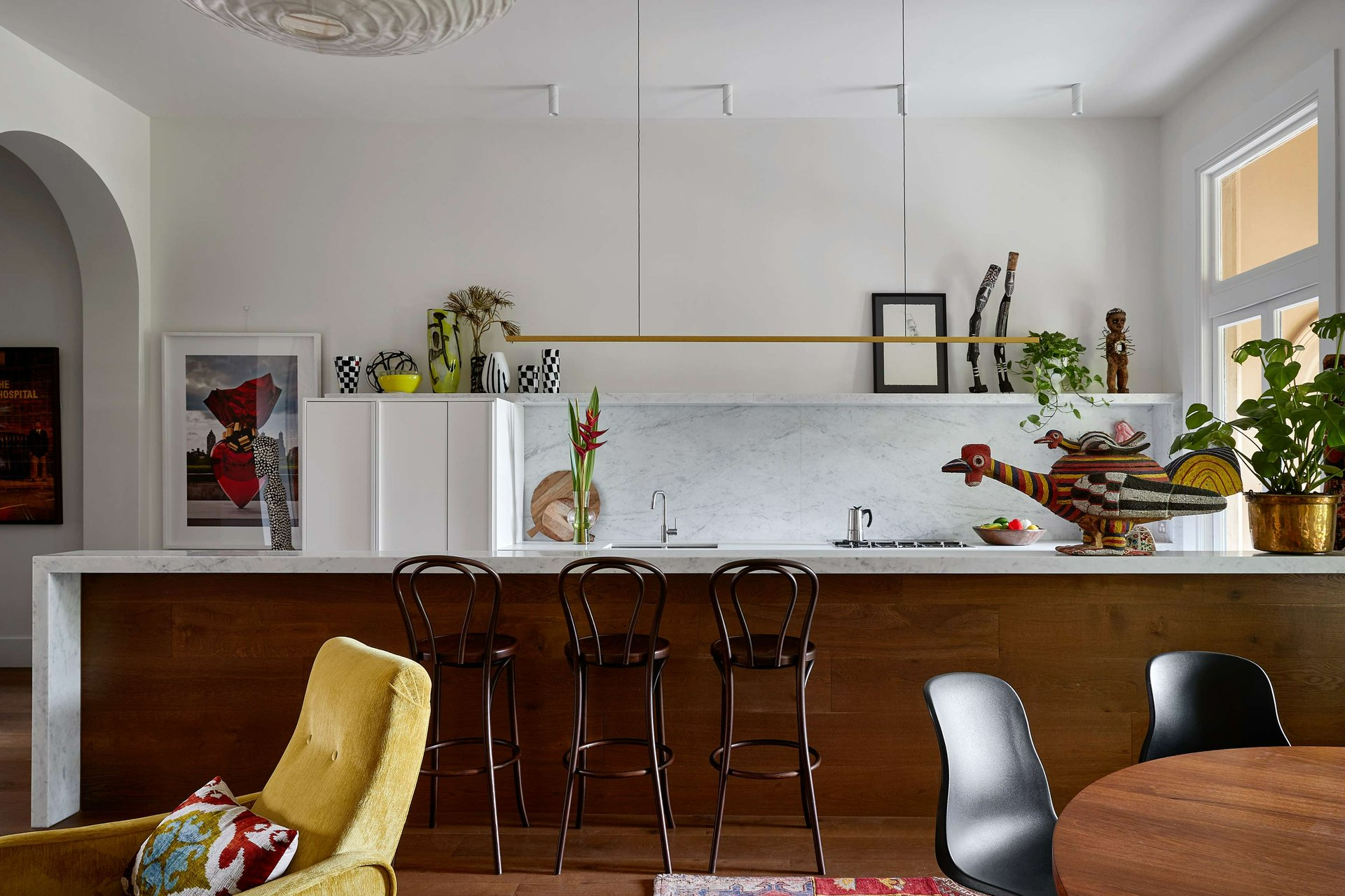 Kate's New Place by Bower Architecture & Interiors. Photography by Shannon McGrath. Galley kitchen withe eclectic aesthetic, with bright and patterned decor. 