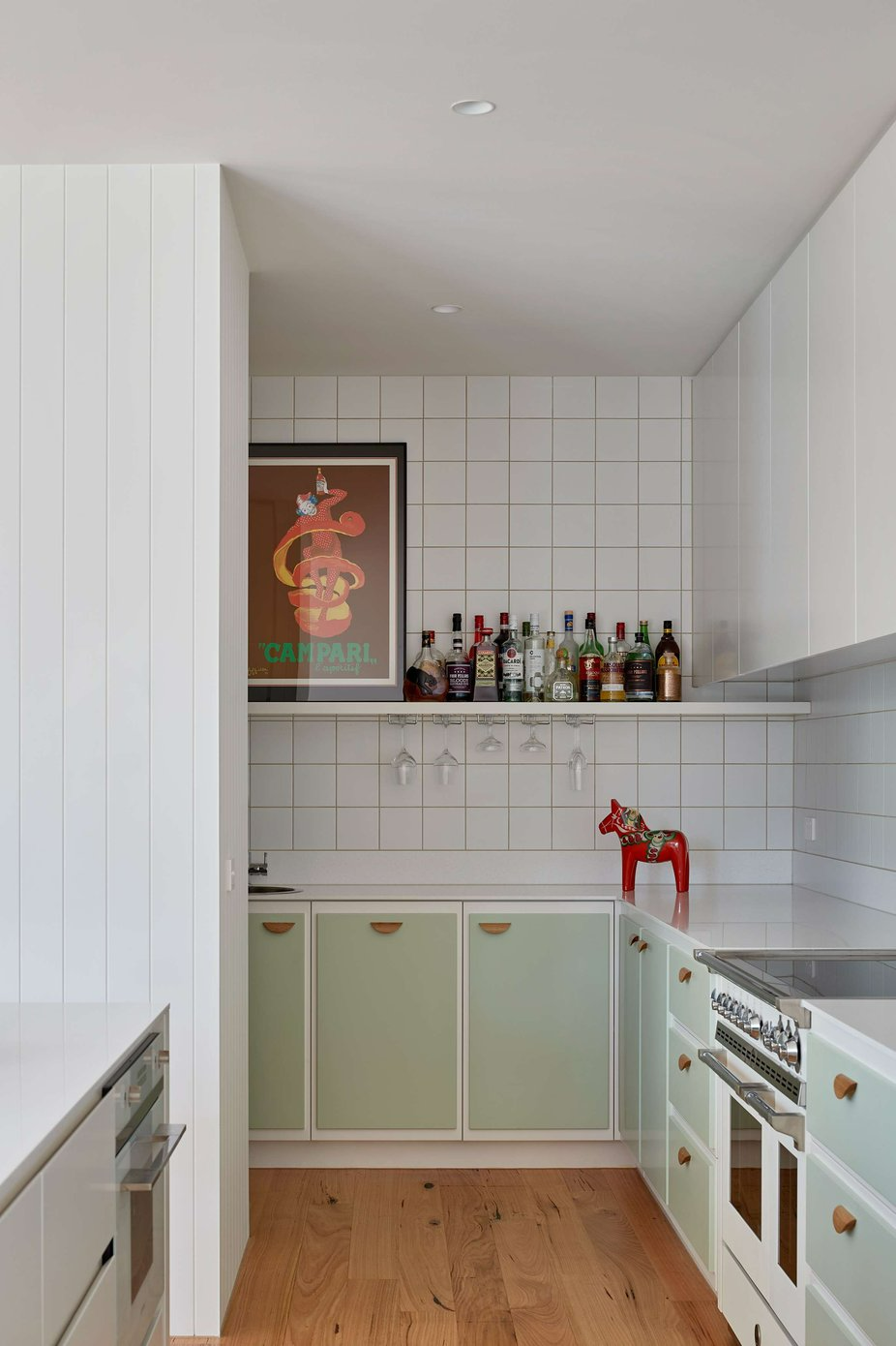 The Blairgowrie Beach Club by Bower Architecture & Interiors. Photography by Shannon McGrath. Scullery with cabinets, shelves and mint cupboard faces. 