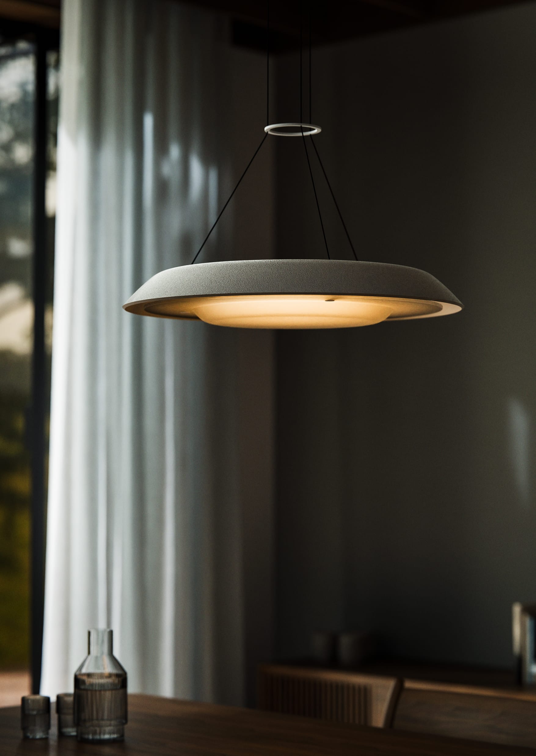 Husk Collection By South Drawn. Photography by Reannon Smith. The Husk pendant lamp hovers serenely overhead, casting a warm, diffused light through its sculptural Zeoform form.