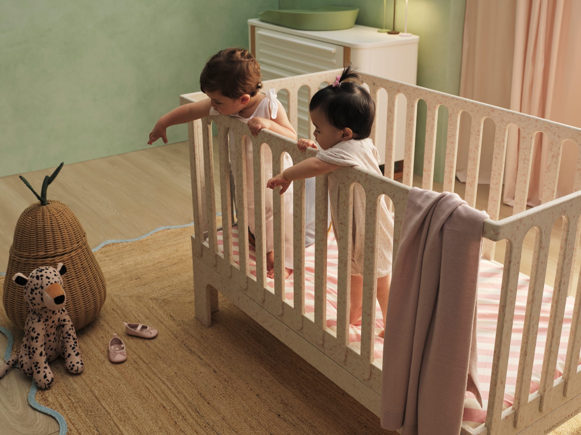 Archie Cot by Seena x Defy in Sage Spray. 