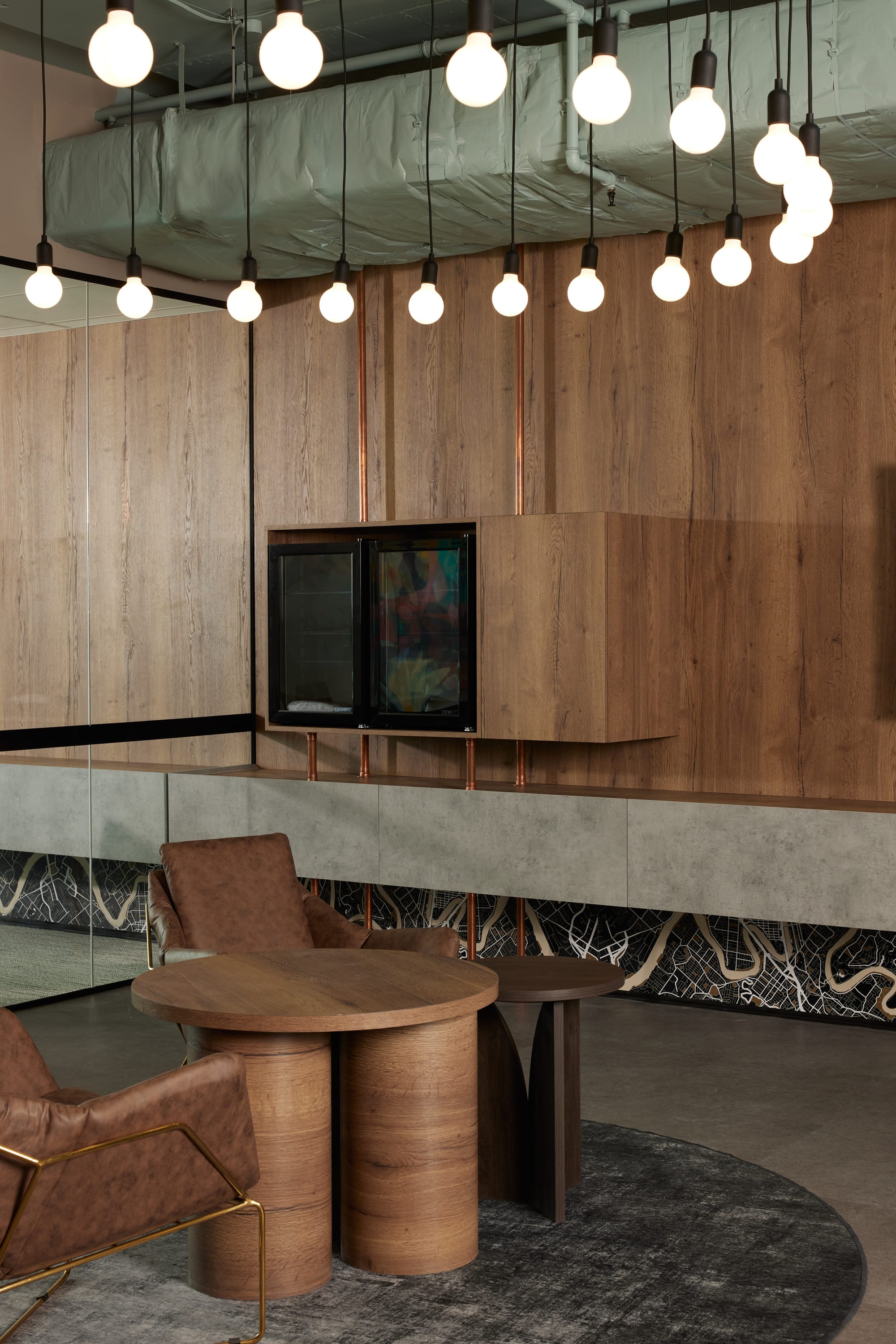 Billiani, Brand Partner for M&E Interiors. Various hairs and armchairs arranged on concrete rooftop with views over native bushland. 