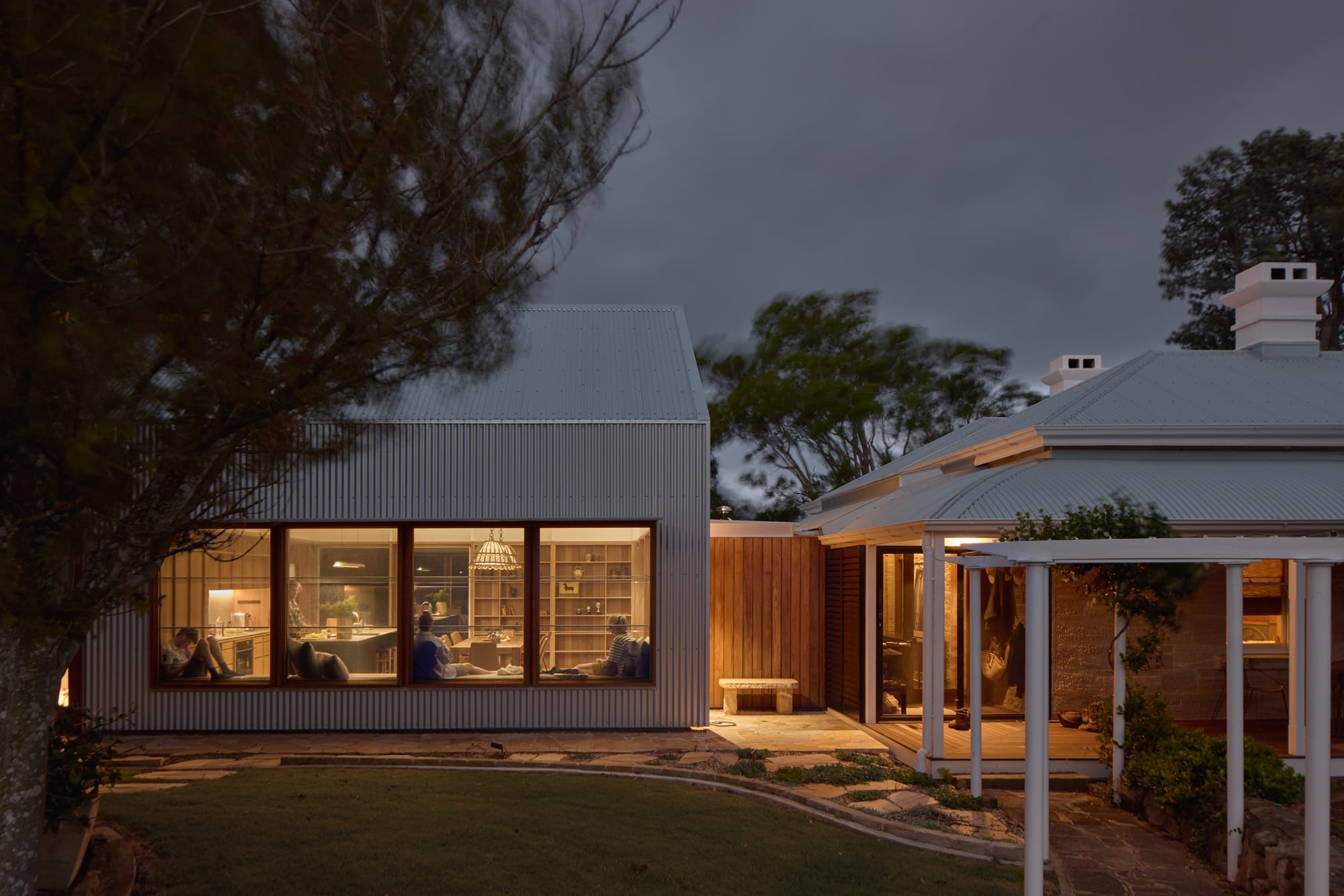 Binnum Homestead by Alexandra Buchanan Architecture. Photography by Cieran Murphy. Traditional homestead structure to the right, with modern A-frame addition to the left. 