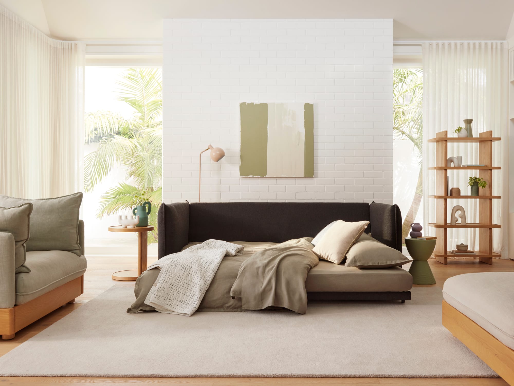 Koala's Byron Bay Sofa Bed in Currawong Grey in a well styled living space.