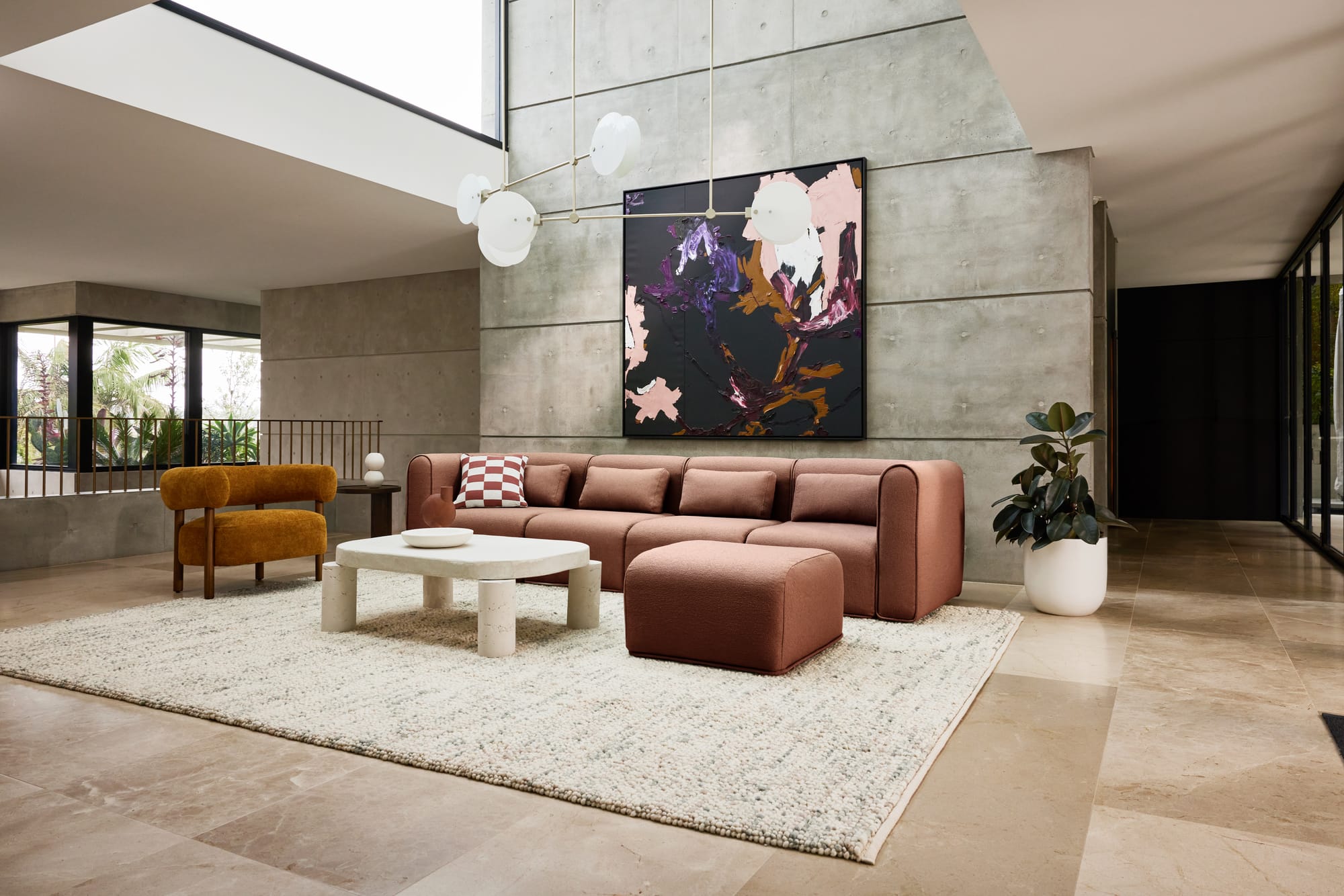 Koala's Bangalow Modular Sofa Bed in Sunset Rust in a well styled living space.