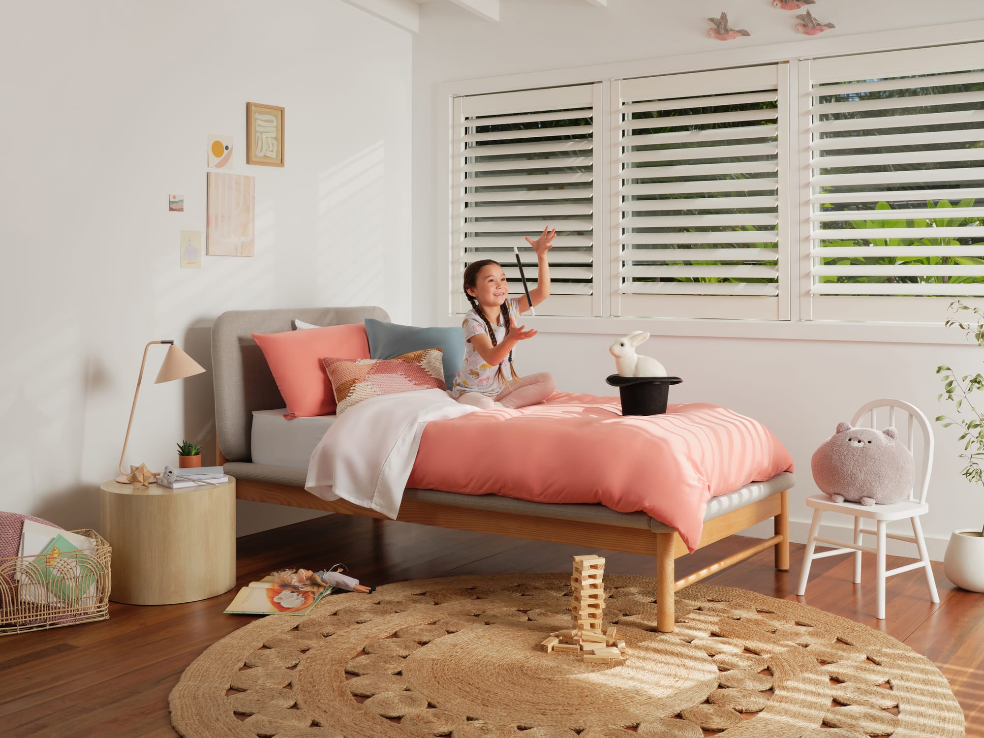 Koala Paddington Bed Base. Childs bedroom with jute rug, timber flooring and bedframe with pink bedding. 