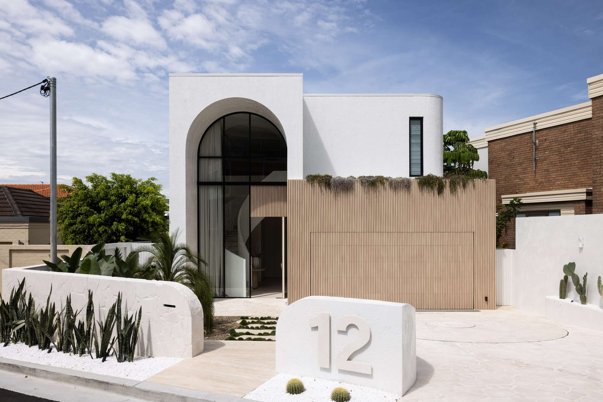 Contemporary architect-designed home exterior highlighting facade design, material selection and spatial planning