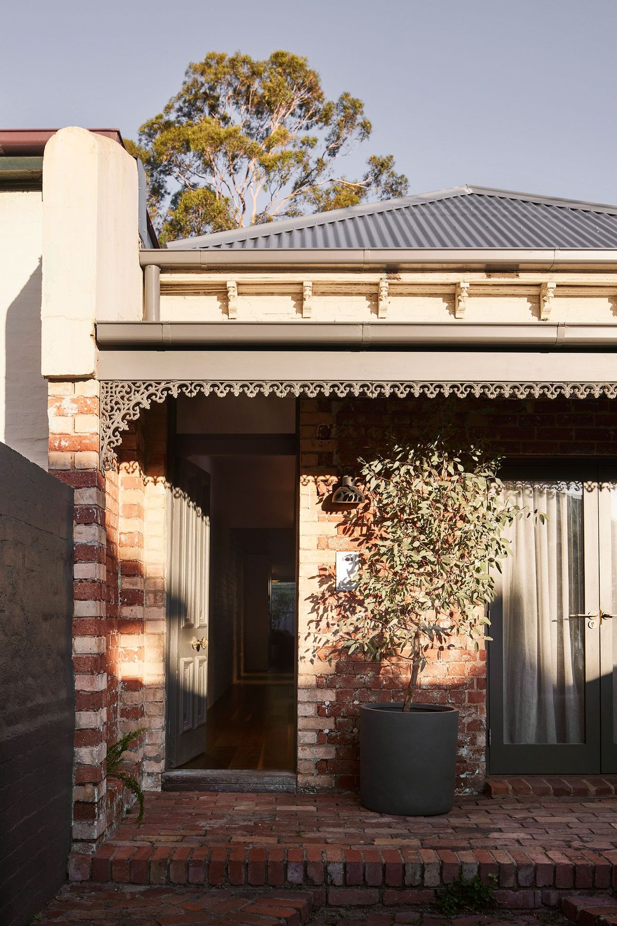 Casa Victoria by Splinter Society. Exterior Facade view of Victorian terrace, featuring original ornate detailing . 