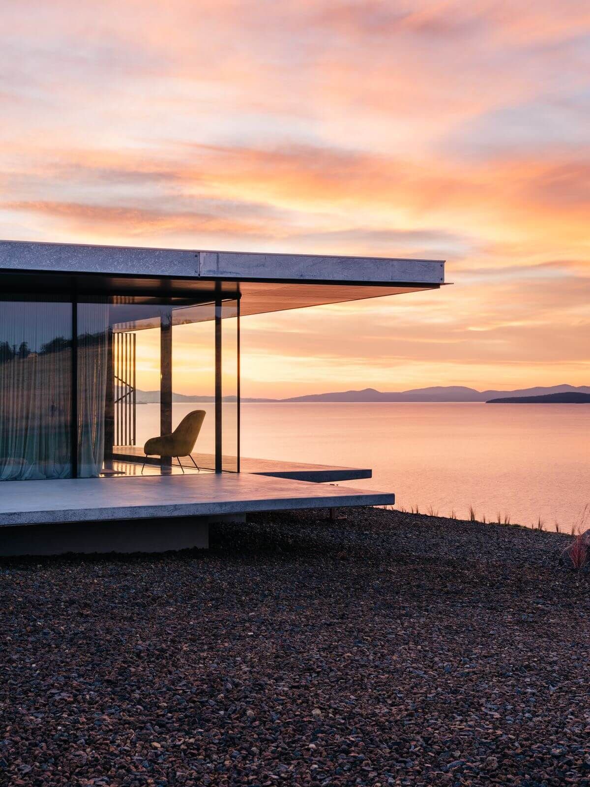The Point Tasmania. Exterior view of The Point looking out to Tasmania's Coast during sunset.