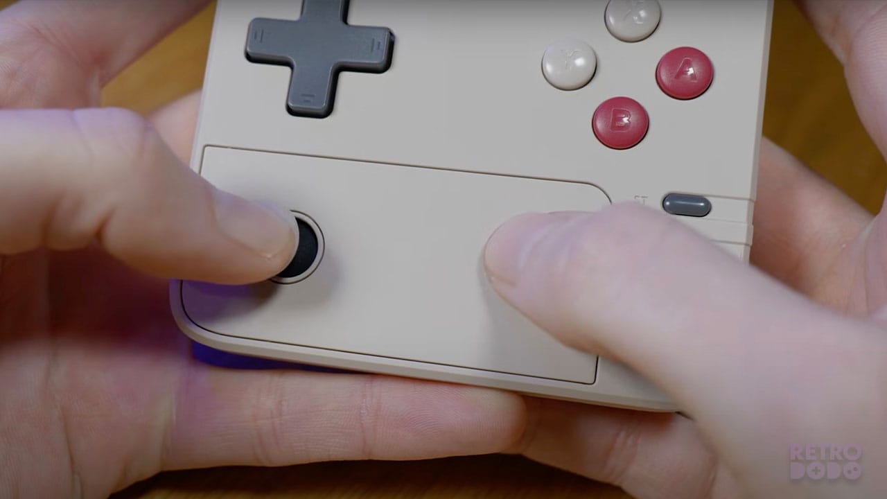 Rob using an analogue stick and the touch pad 