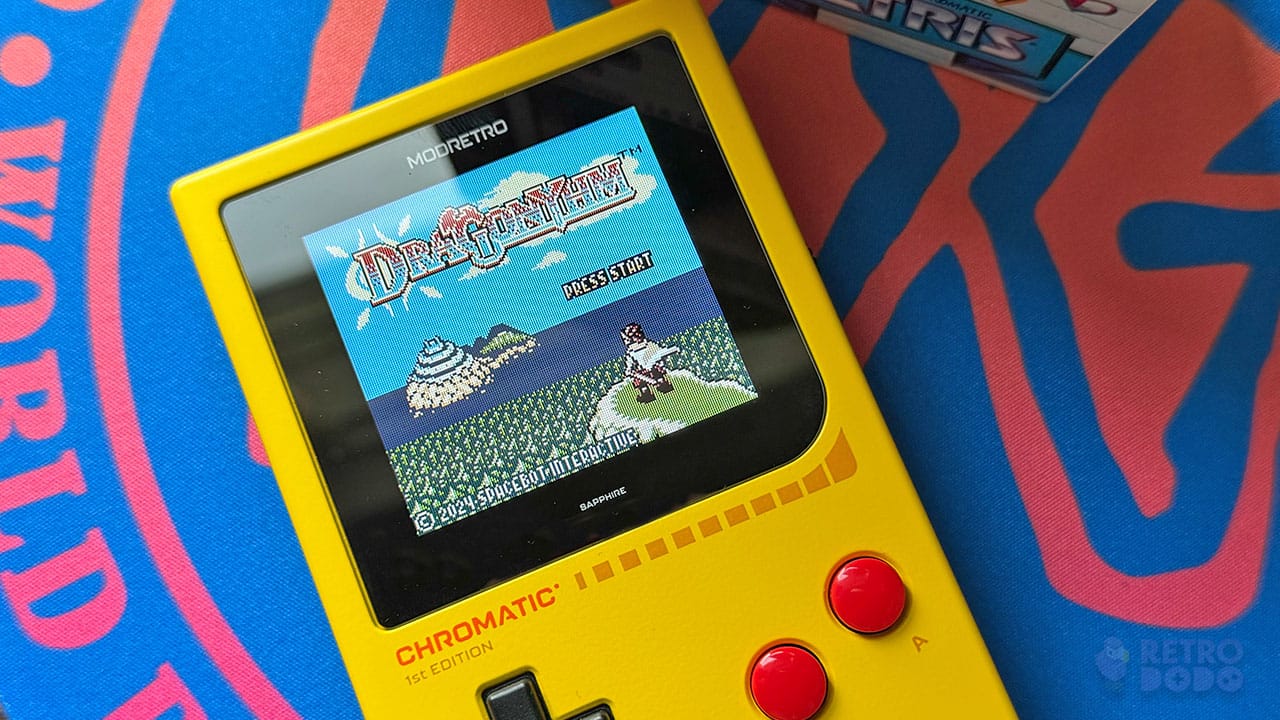 The intro screen to Dragonyhm on seb's yellow ModRetro Chromatic