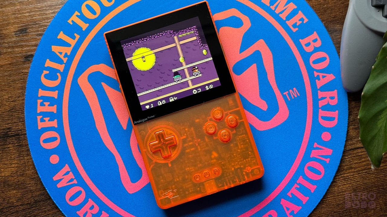 Kero Kero on a mine cart in a purple dungeon