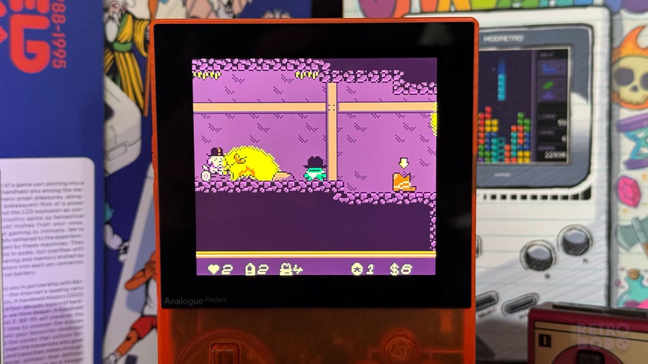 Kero Kero standing next to a camp fire and a large cowboy boot