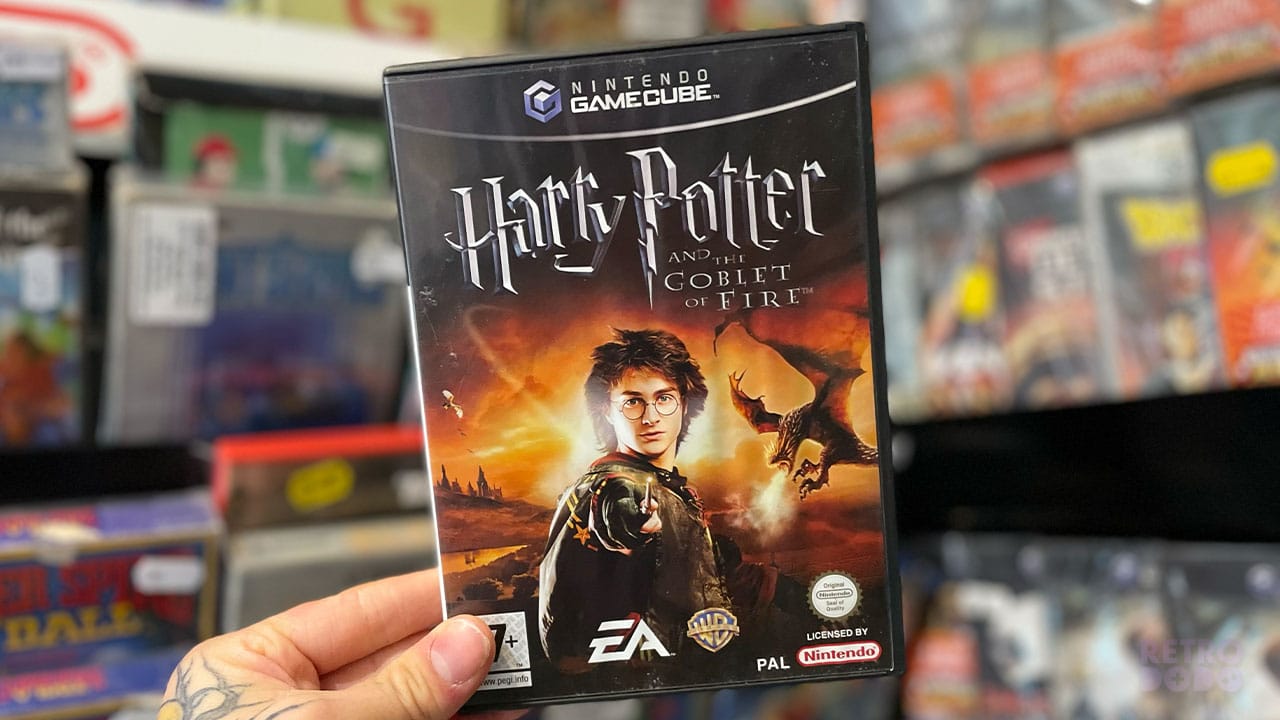 Seb holding Harry Potter and the Goblet of Fire