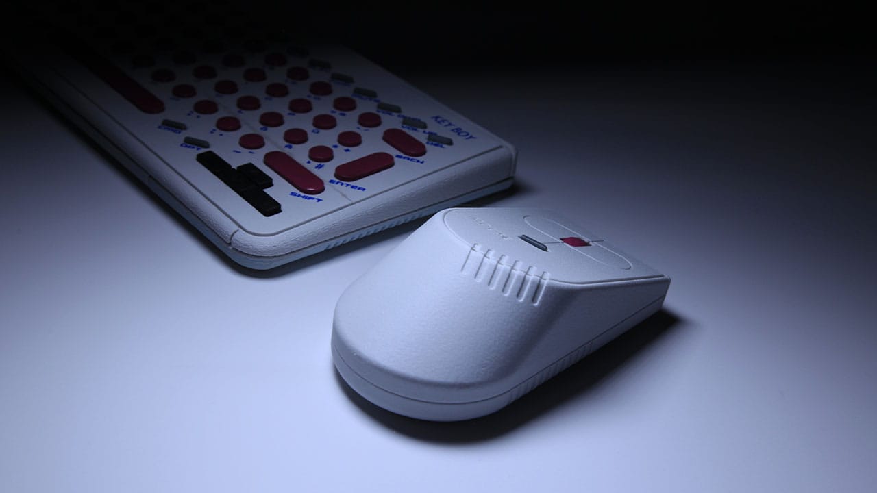 A Game Boy Mouse next to the Key Boy keyboard