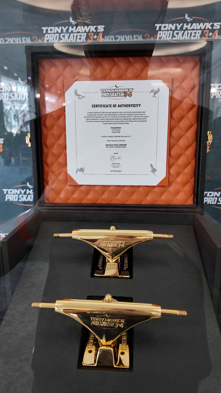 A set of 24-carat gold trucks