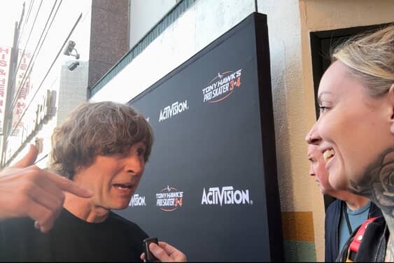 Maggie speaking with a skateboarder