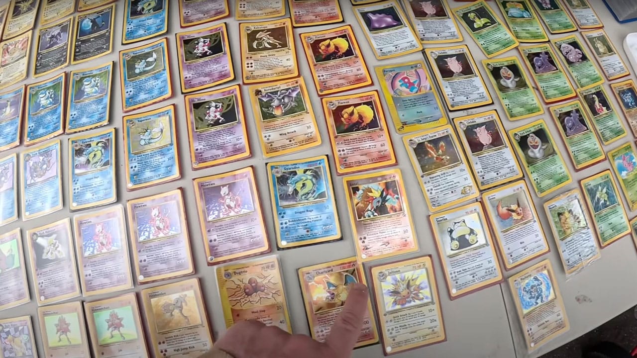Pokémon cards laid out on a table