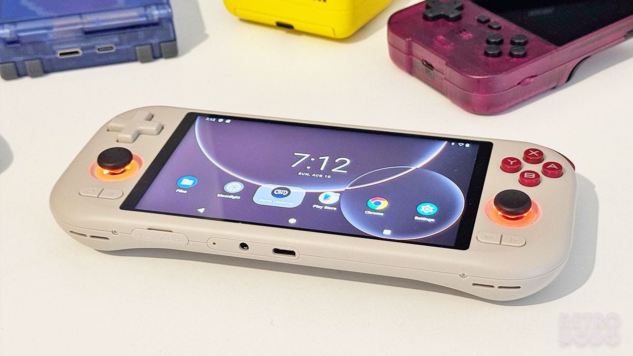 MANGMI Air X on a table with three other handhelds