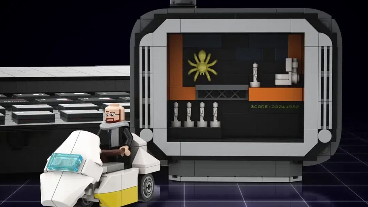 Sir Clive Sinclair LEGO figure with a LEGO TV behind