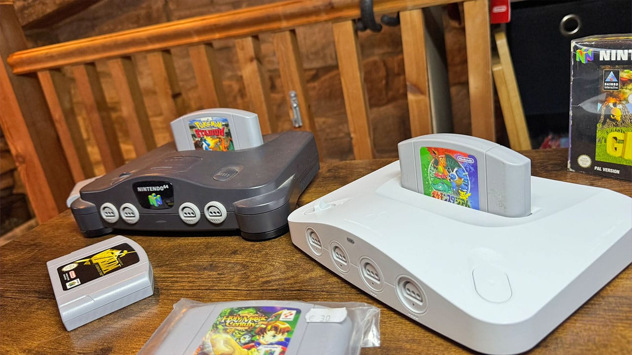 Analogue 3D next to Seb's N64, both with copies of Pokémon Stadium (one PAL, one J-NTSC)