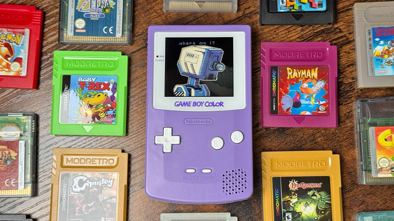 Self Simulated on the Game Boy surrounded by cartridges