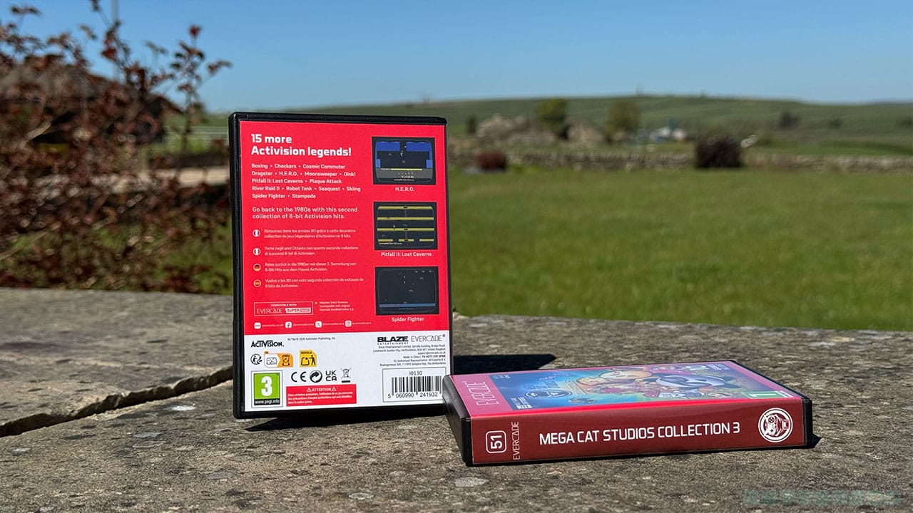 Two game boxes on a wall