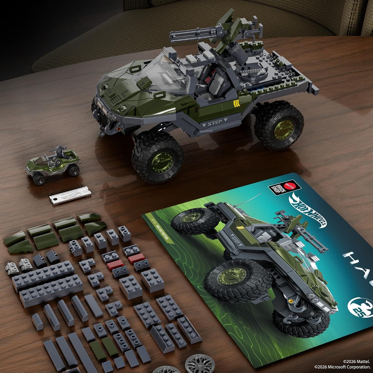 Pieces from the set with an instruction booklet next to it