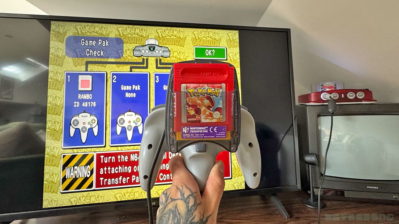 Pokémon Red in a Transfer Pak slotted into Seb's original N64 controller, which is plugged into the M64