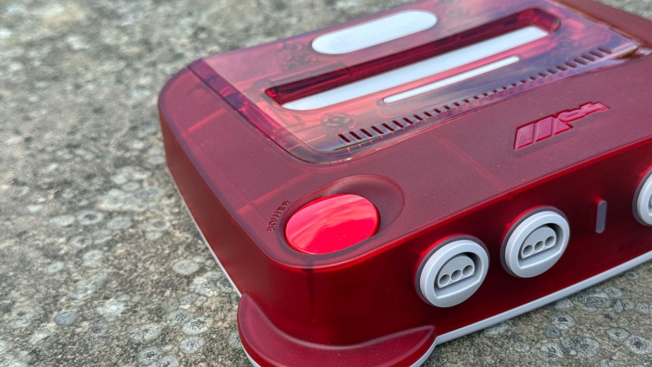 Red power button on the M64