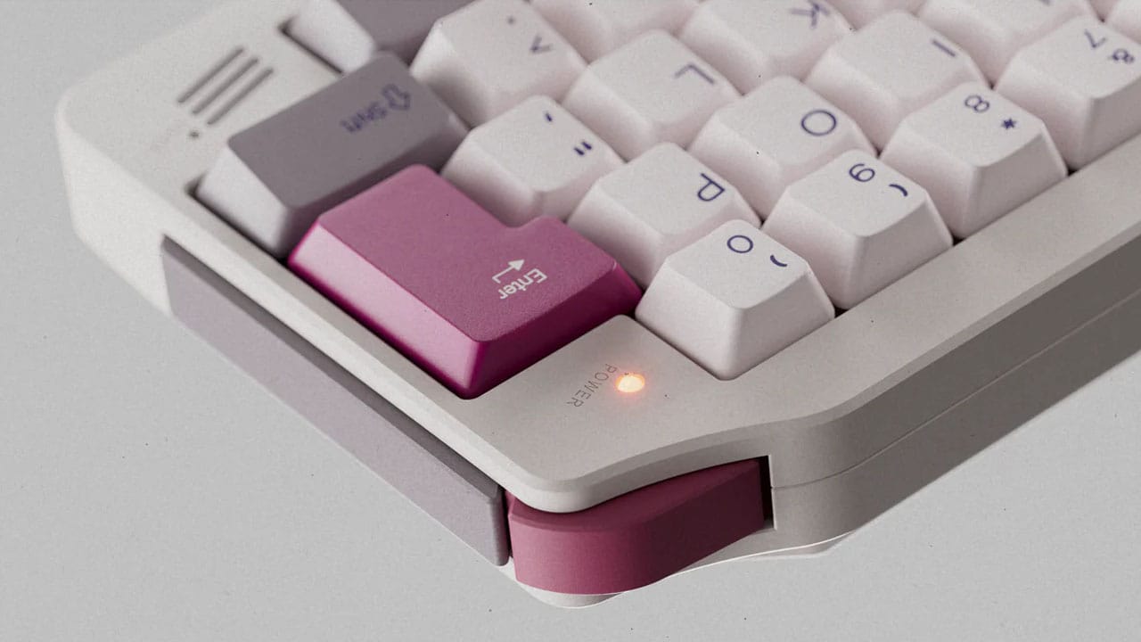 Shoulder button on the KeyBoy Advance and the Enter button. Other grey keys are in the picture